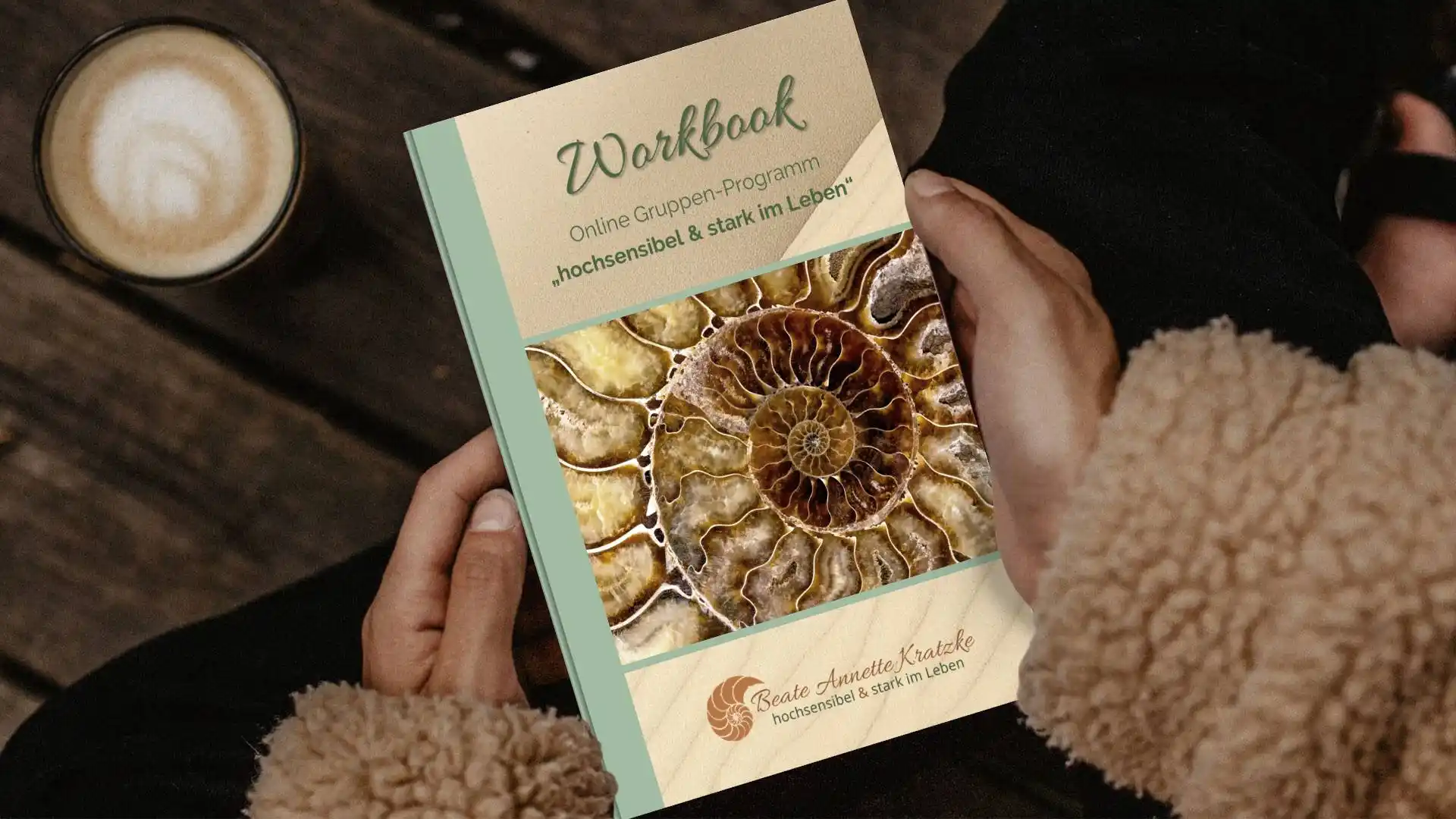 Workbook in hands